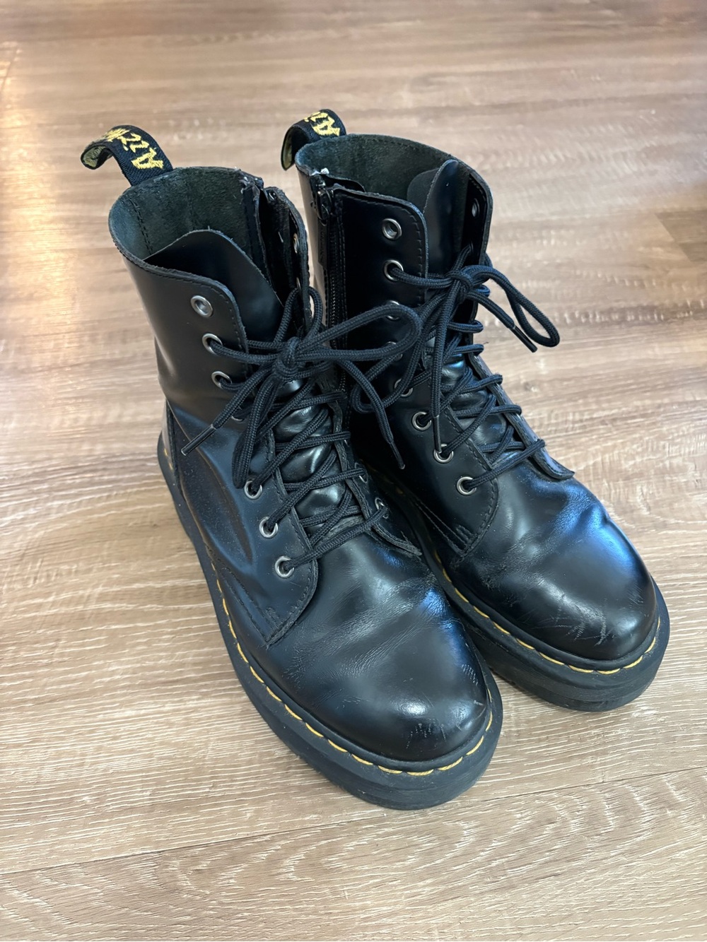 Dr. Martens Black Leather Combat Boots with Yellow Stitching